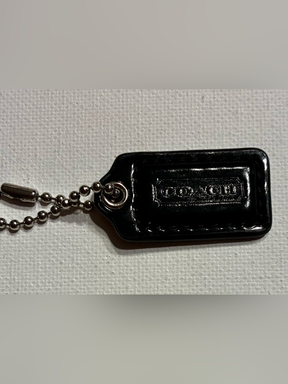 Coach EUC  Black Patent Leather Mini (@1.5”) Hang Tag with Embossed Logo for Bag